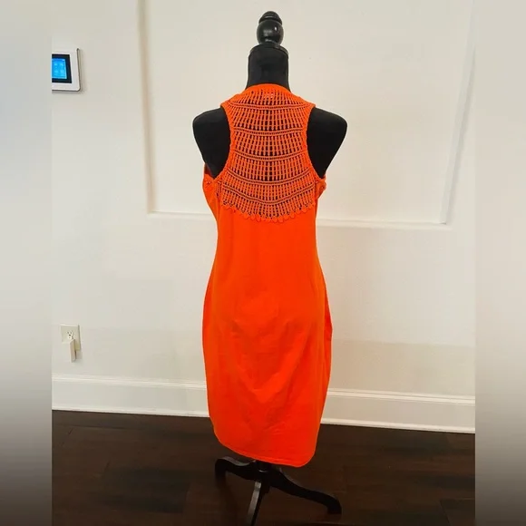 Orange sleeveless dress with crochet back. It’s a fitted dress - Picture 3 of 6
